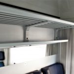 Overhead baggage racks in a ČD compartment coach (Bmz)